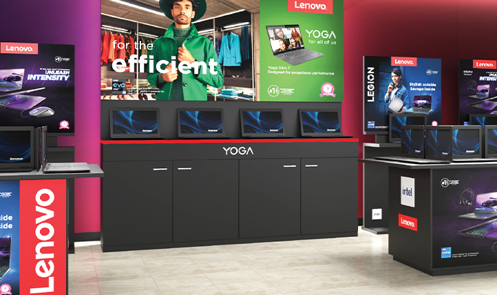 Lenovo branded retail space displaying laptops and campaign graphics.