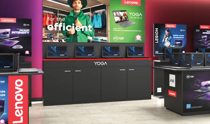 Lenovo branded retail space displaying laptops and campaign graphics.