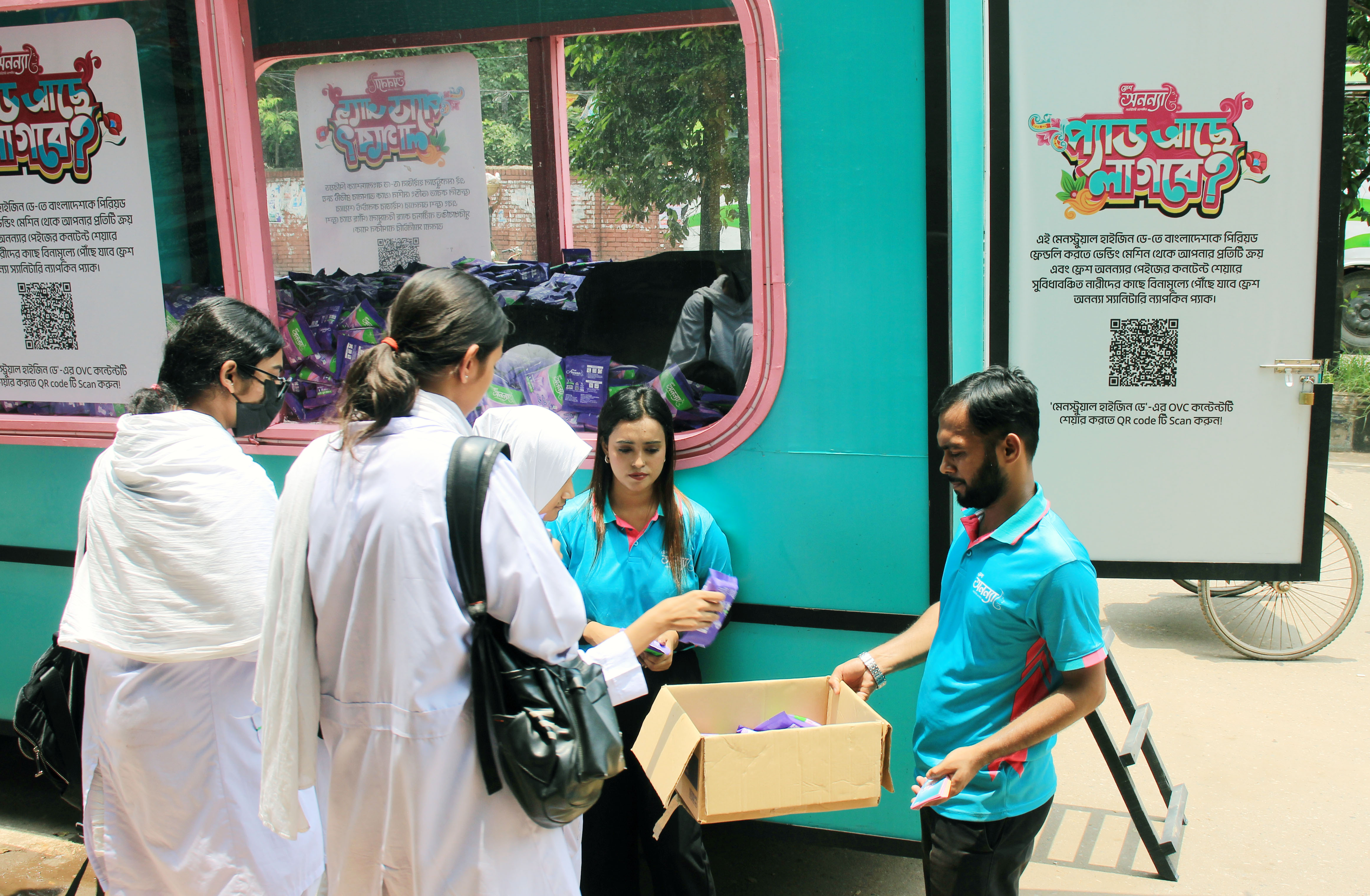 Fresh Anonna caravan beside the branded activation vehicle.